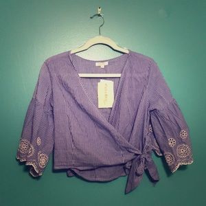 Striped crop top with side tie & sleeve detail.